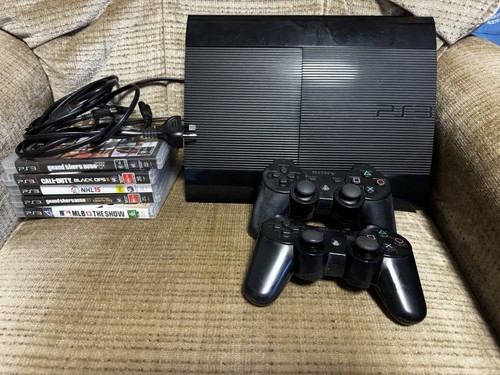 Sony PlayStation 3 Super Slim 500GB Black CECH-4202C, 5 Games And 2 Controllers